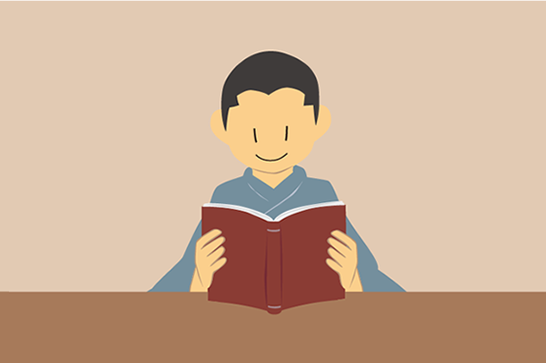 伝記を読む忠雄少年